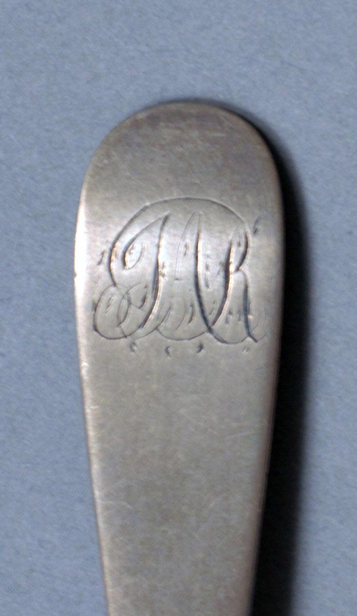 1962.0240.399 Silver spoon engraving