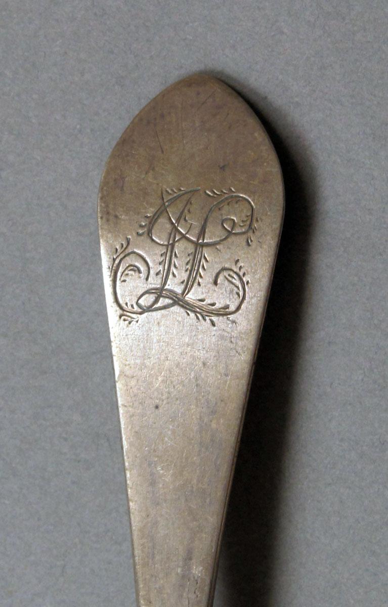 1962.0240.403 Silver spoon engraving
