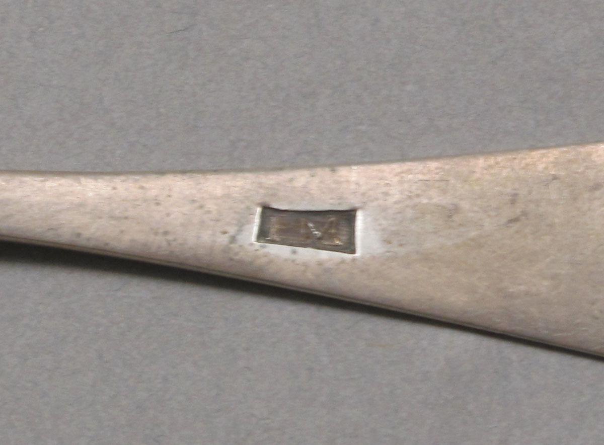 1962.0240.403 Silver spoon mark