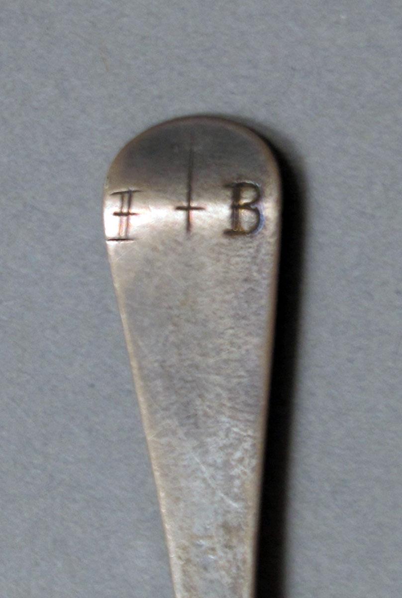 1962.0240.406 Silver spoon engraving