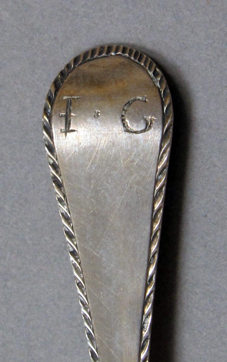 1962.0240.410 Silver spoon engraving