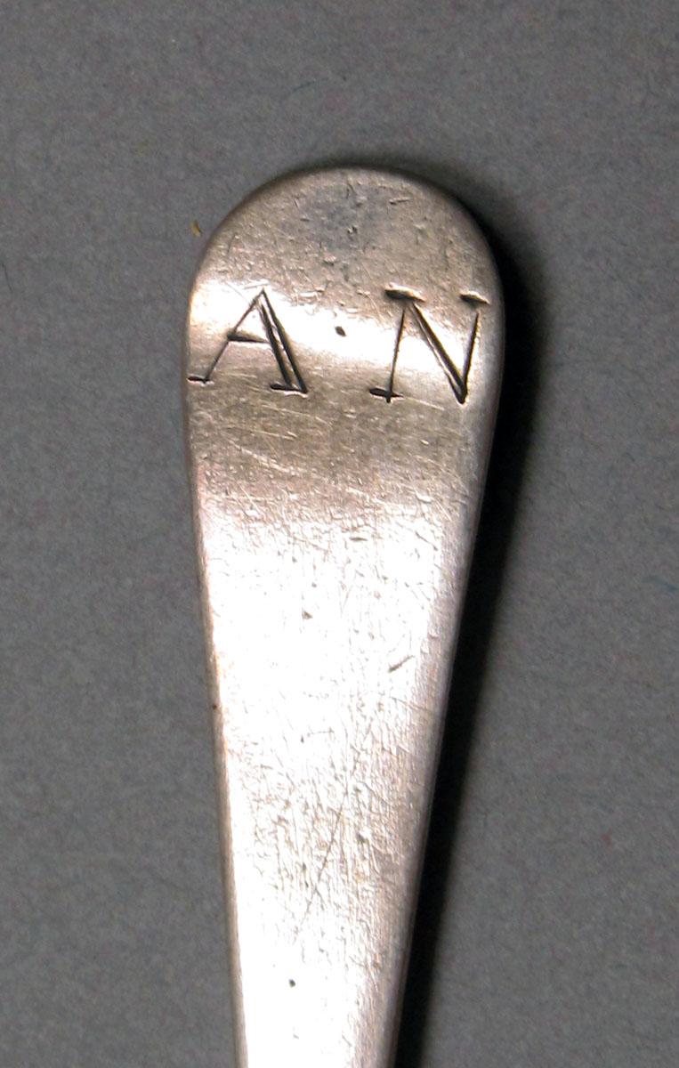 1962.0240.411 Silver spoon engraving