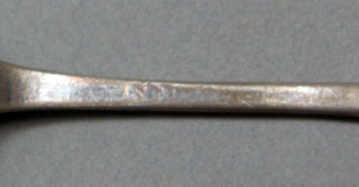 1962.0240.411 Silver spoon mark