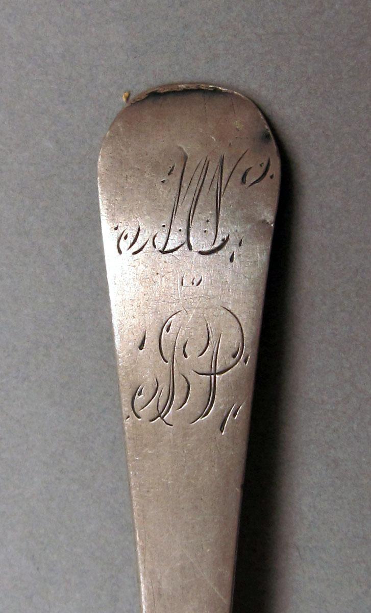 1962.0240.412 Silver spoon engraving