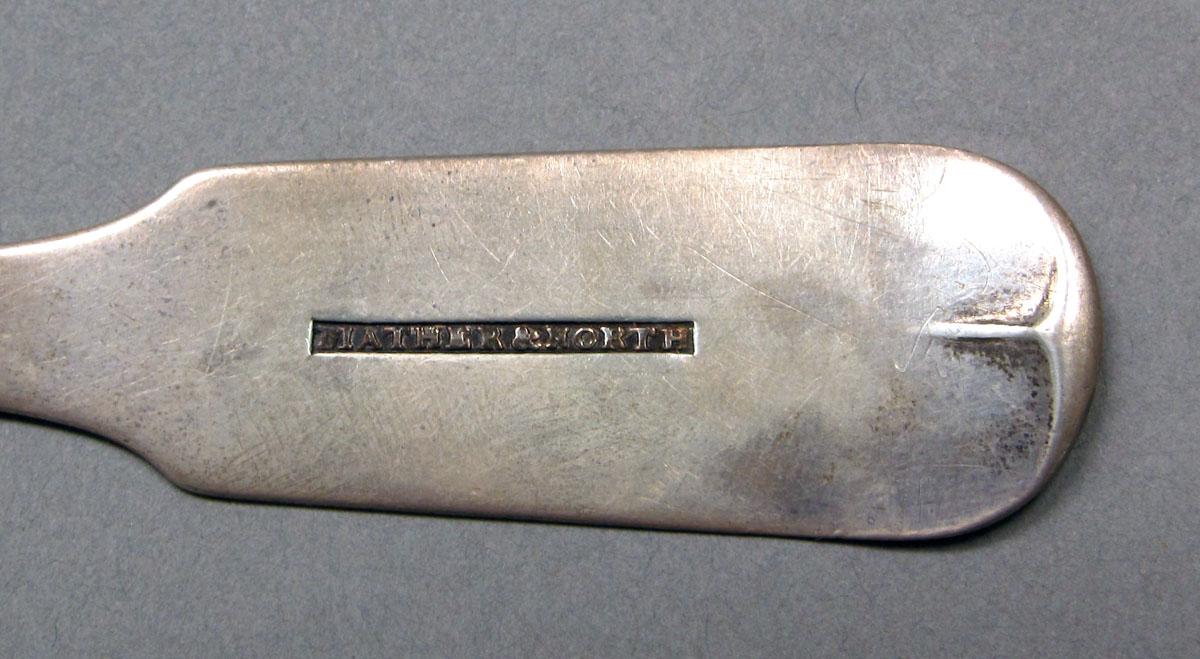 1962.0240.414 Silver spoon mark