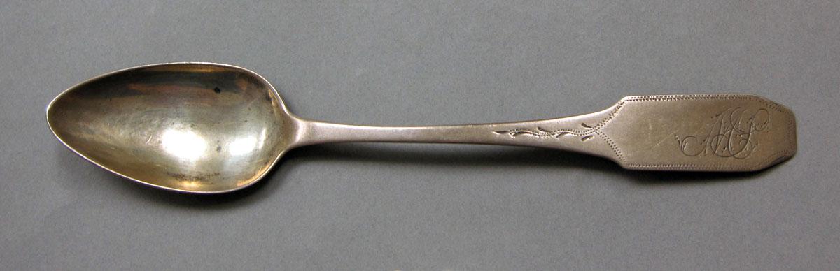 1962.0240.416 Silver spoon upper surface