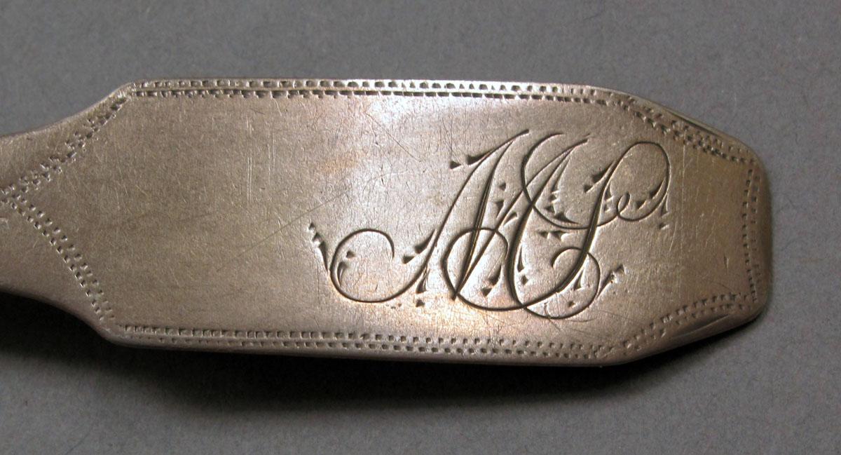 1962.0240.416 Silver spoon engraving