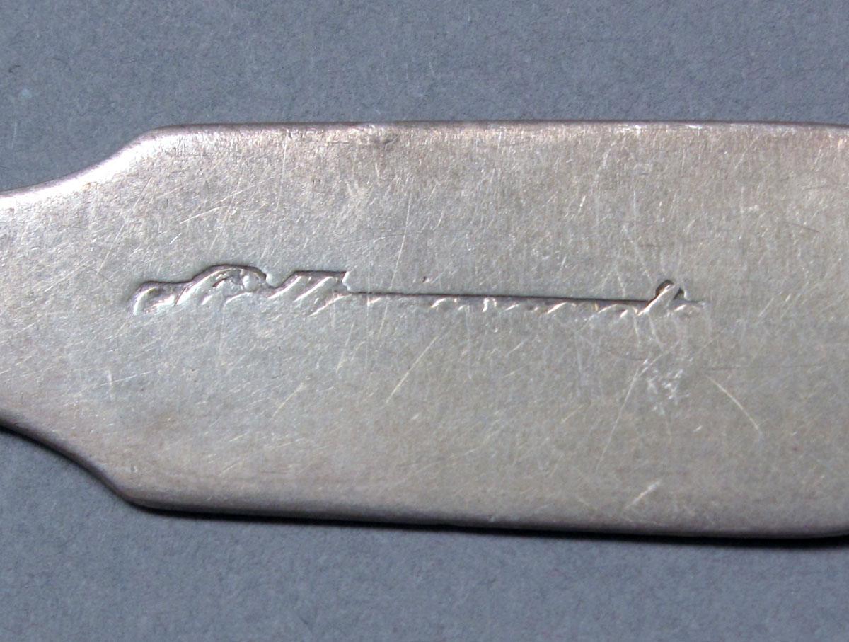 1962.0240.416 Silver spoon mark