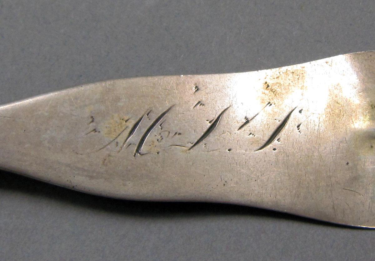 1962.0240.418 Silver spoon engraving