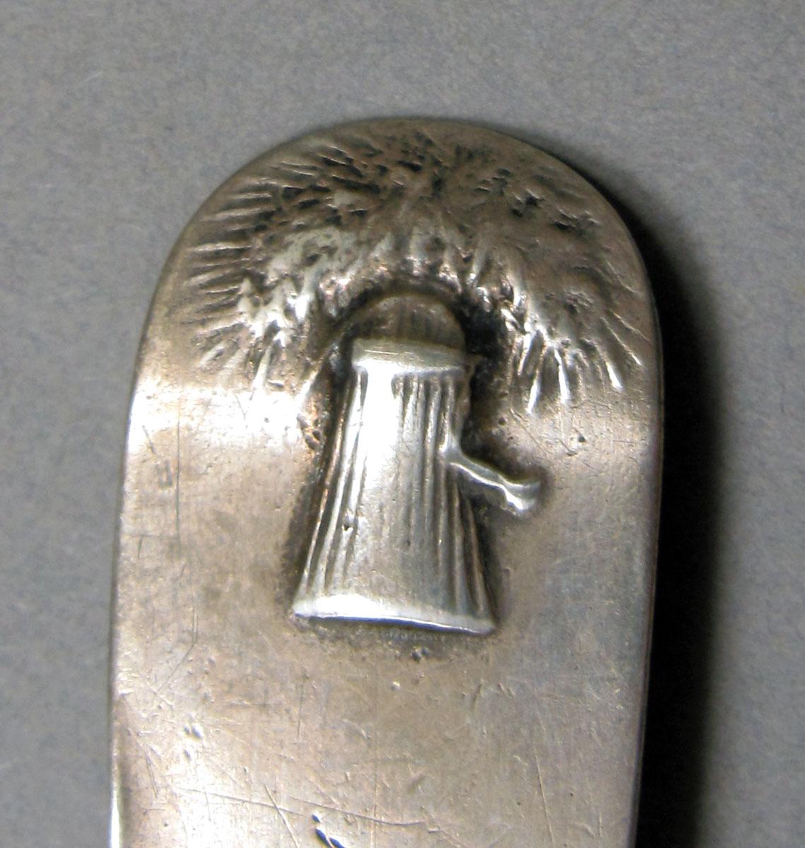 1962.0240.419 Silver spoon detail