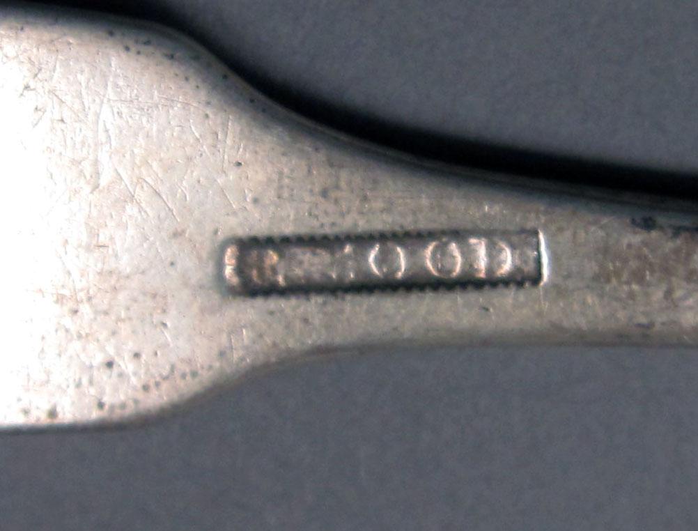 1962.0240.419 Silver spoon mark