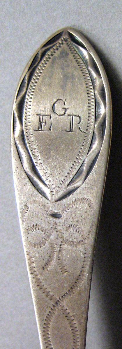1962.0240.429 Silver Spoon engraving