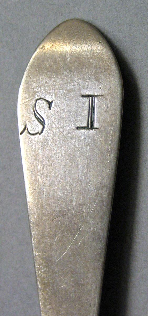 1962.0240.437 Silver Spoon engraving