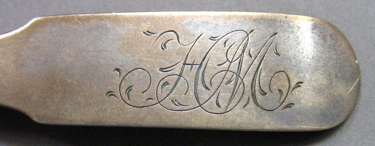 1962.0240.438 Silver Spoon engraving