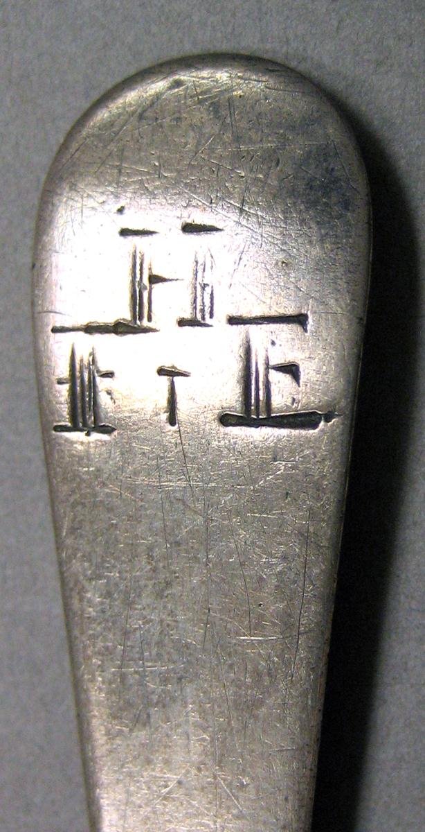 1962.0240.452 Silver Spoon engraving