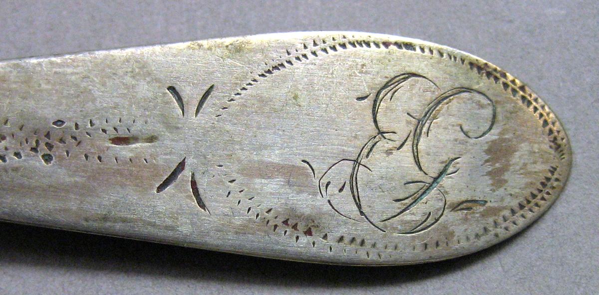 1962.0240.462 Silver Spoon engraving