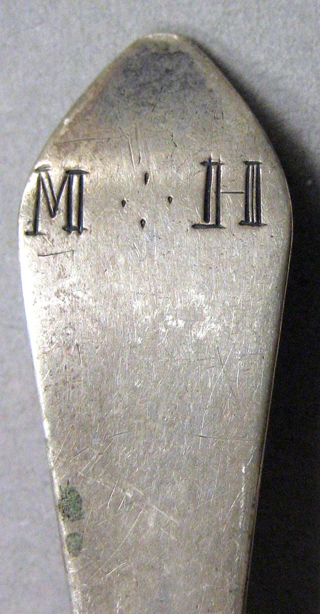 1962.0240.471 Silver Spoon engraving