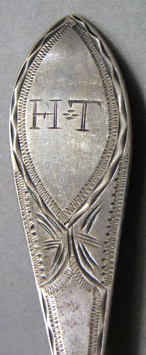 1962.0240.472 Silver Spoon engraving