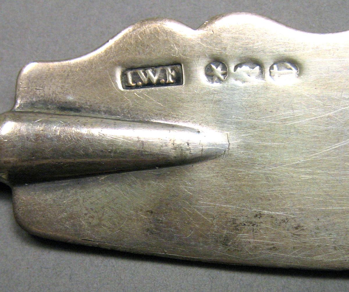 1962.0240.485 Silver Knife mark
