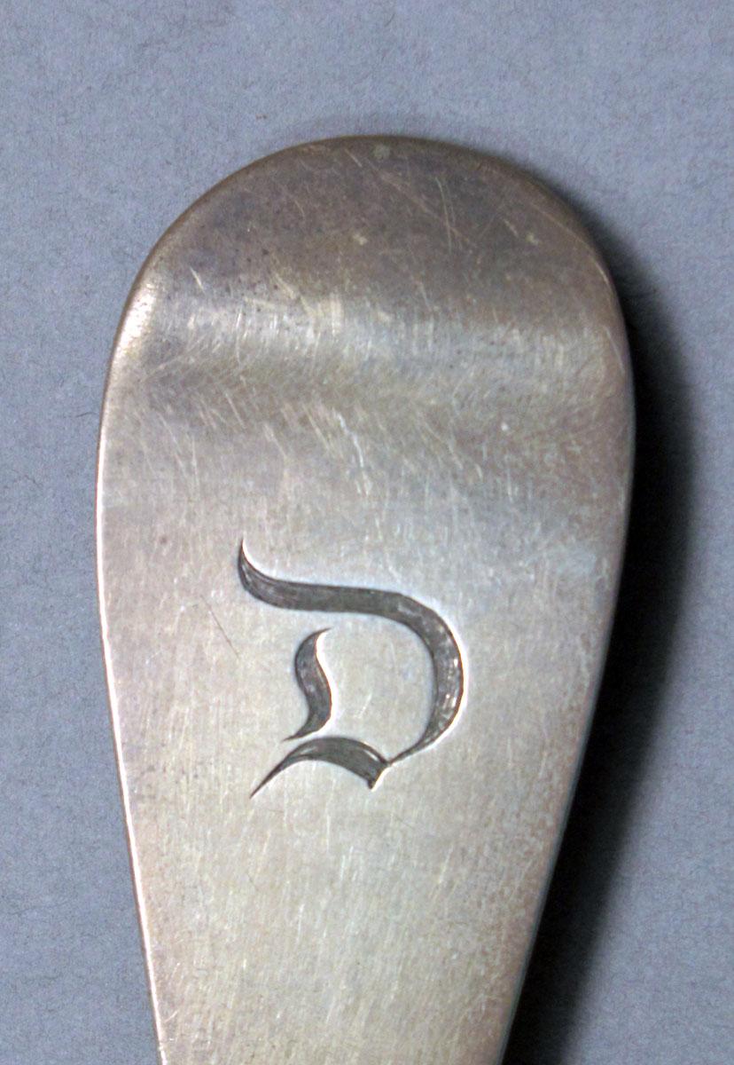 1962.0240.504 Silver fork engraving