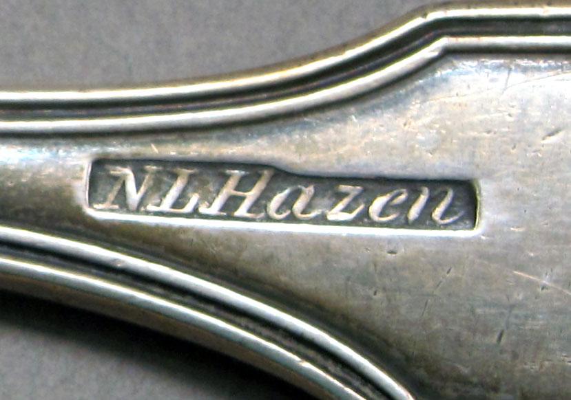 1962.0240.509.002 Silver knife mark