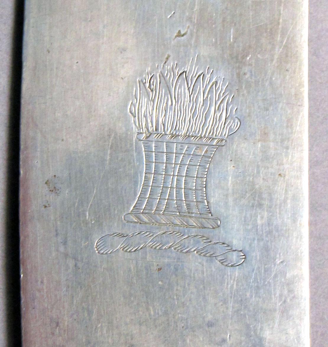 1962.0240.511 Silver knife engraving