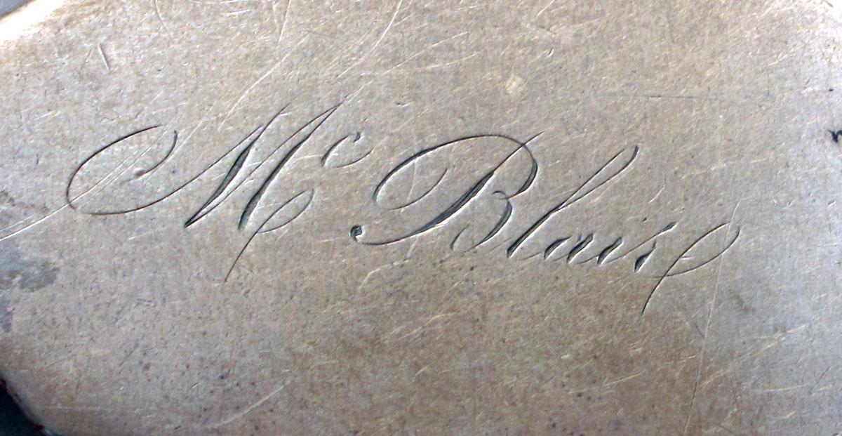 1962.0240.513 Silver fork engraving