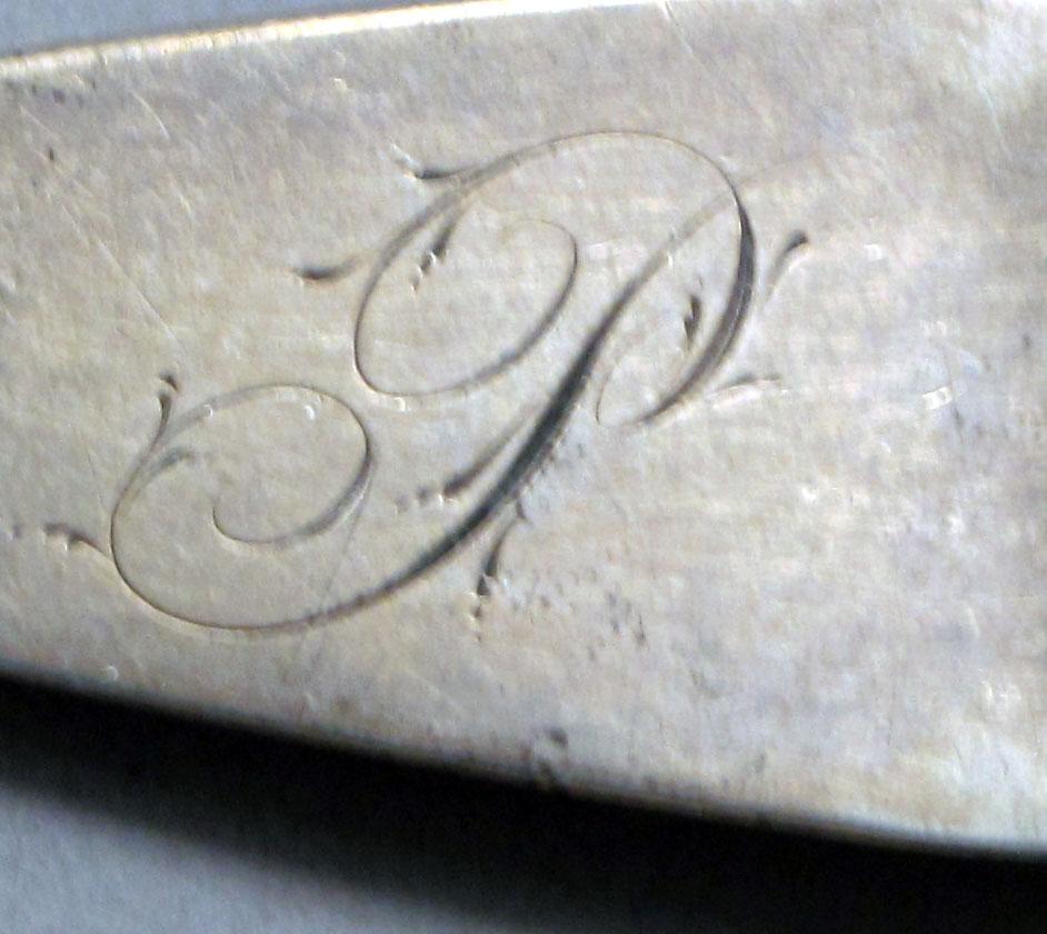 1962.0240.514 Silver fork engraving