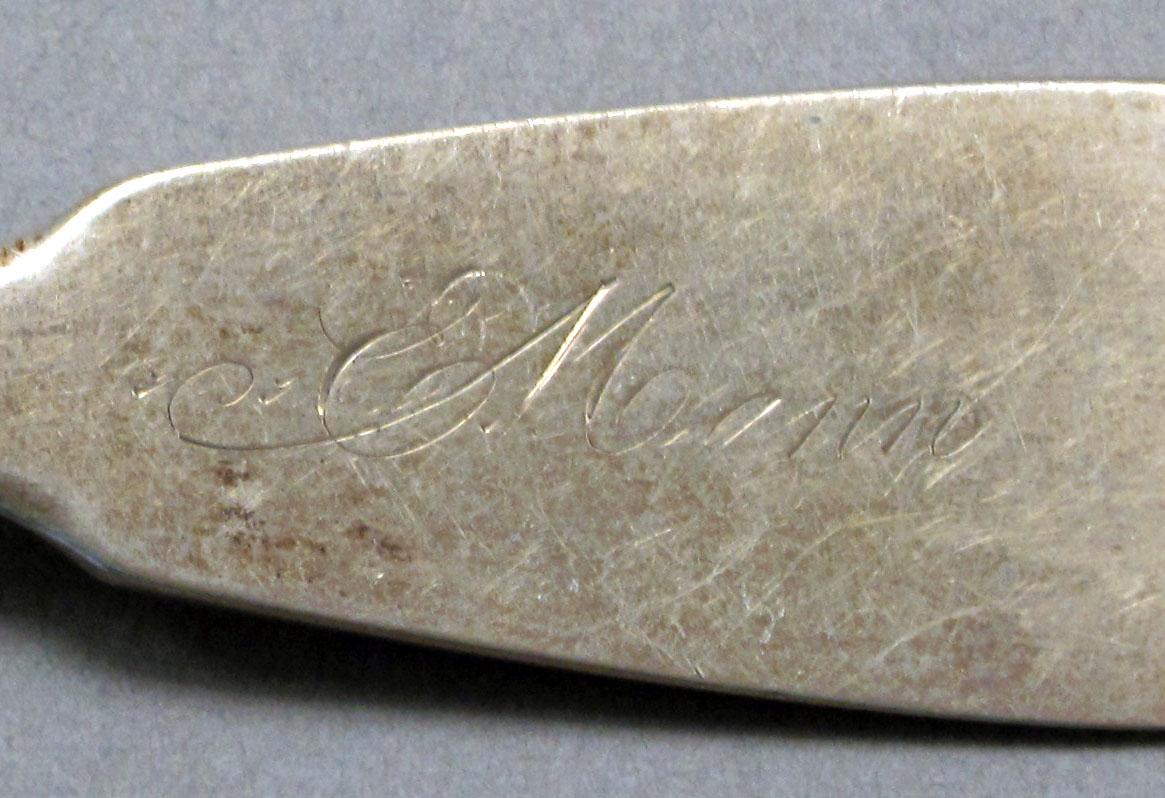 1962.0240.515 Silver fork engraving