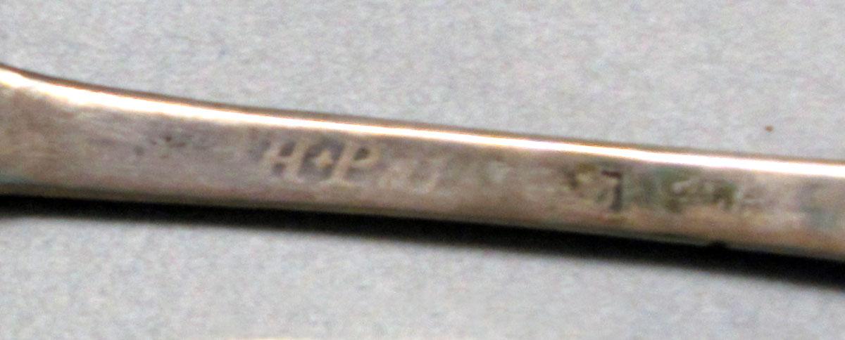 1962.0240.524 Silver spoon mark