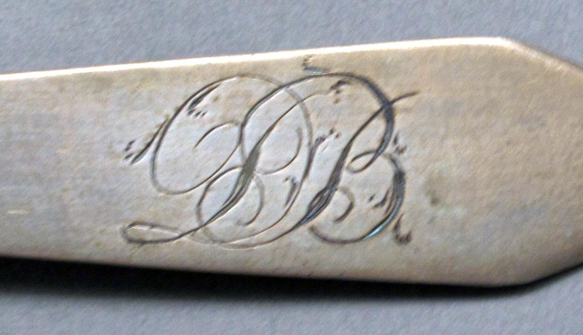 1962.0240.526 Silver spoon engraving