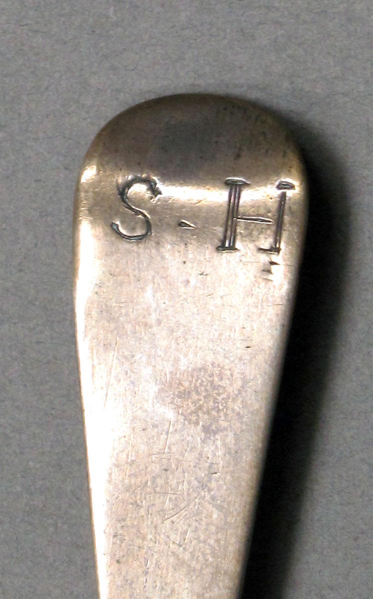 1962.0240.527 Silver spoon engraving