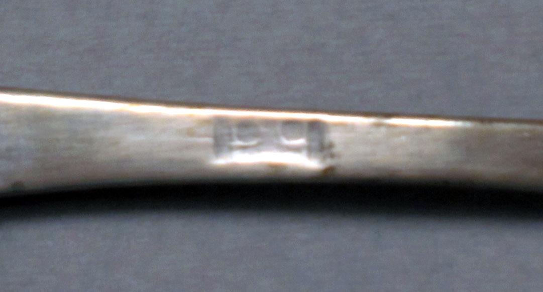 1962.0240.527 Silver spoon mark
