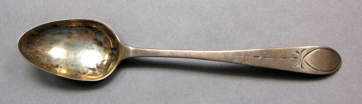 1962.0240.528 Silver spoon upper surface