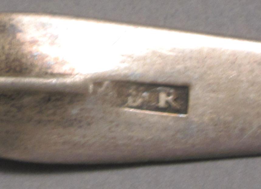 1962.0240.528 Silver spoon mark