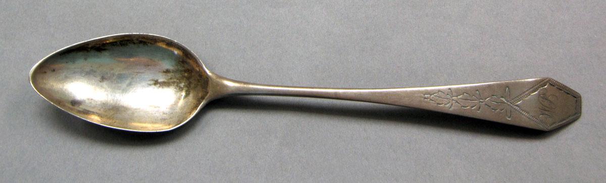 1962.0240.529 Silver spoon upper surface