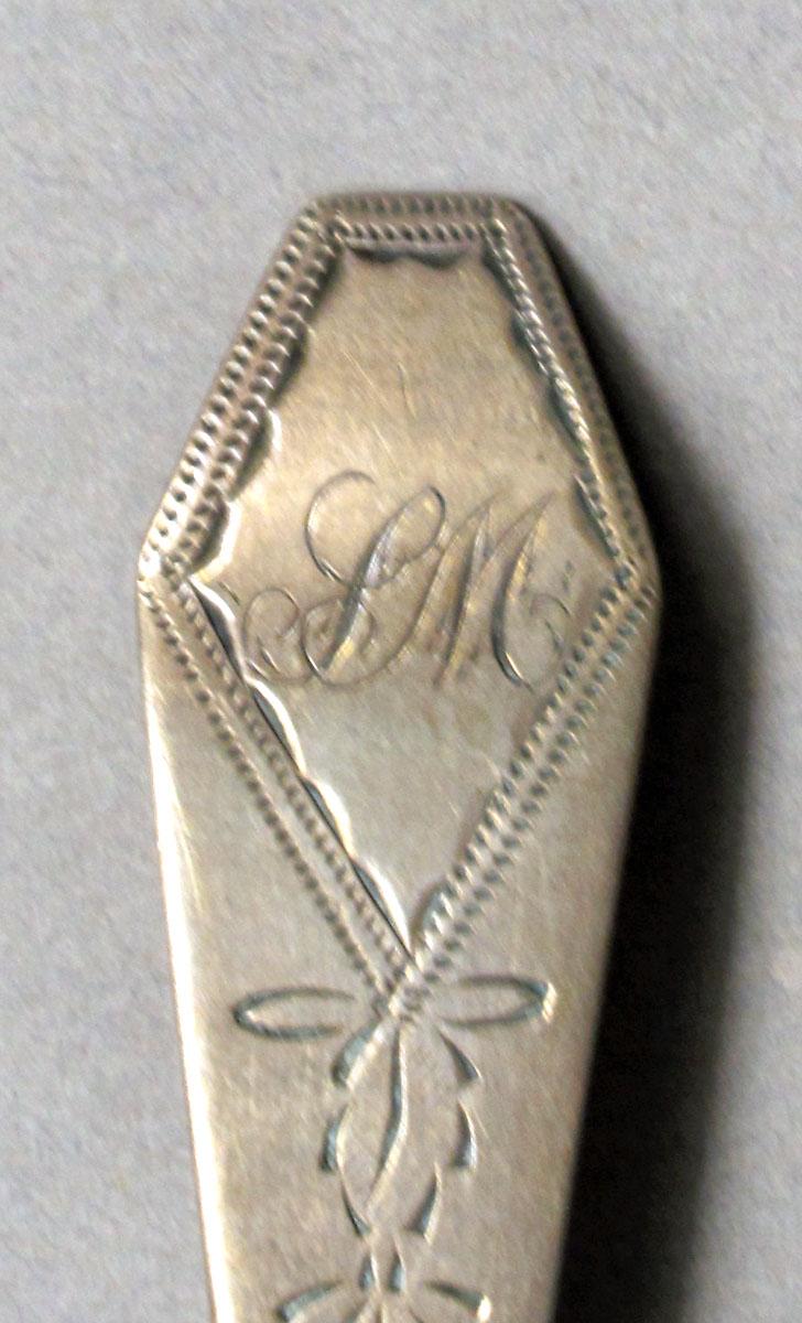 1962.0240.529 Silver spoon engraving