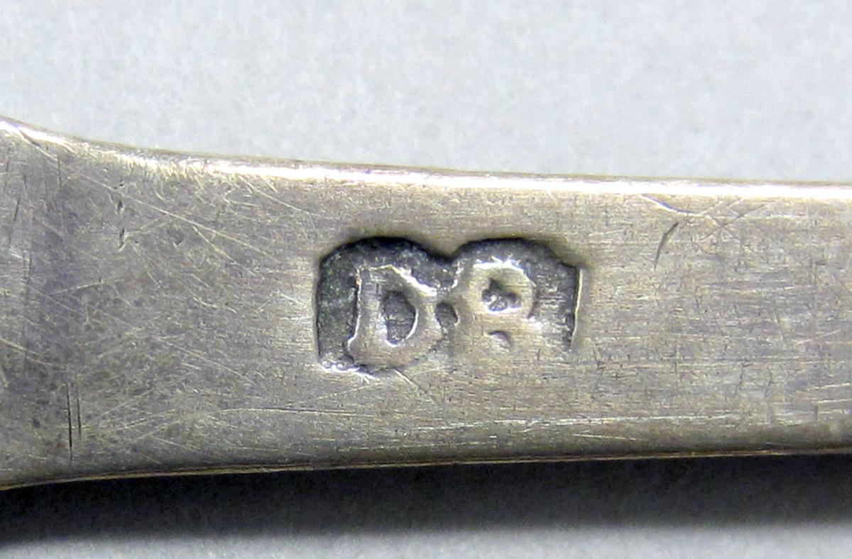 1962.0240.530 Silver spoon mark