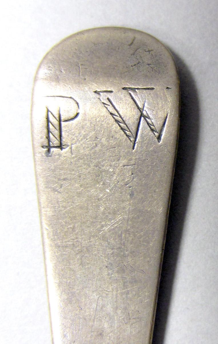 1962.0240.531 Silver spoon engraving