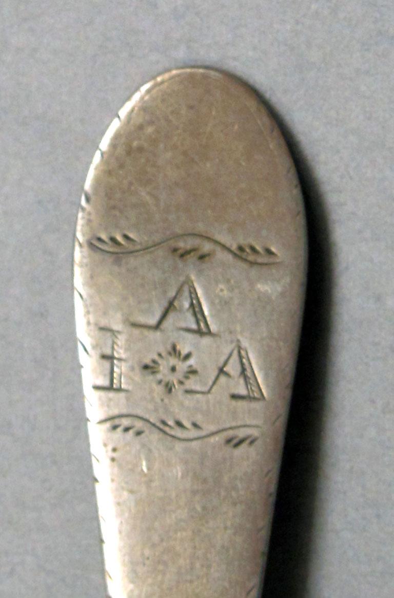 1962.0240.534 Silver spoon engraving