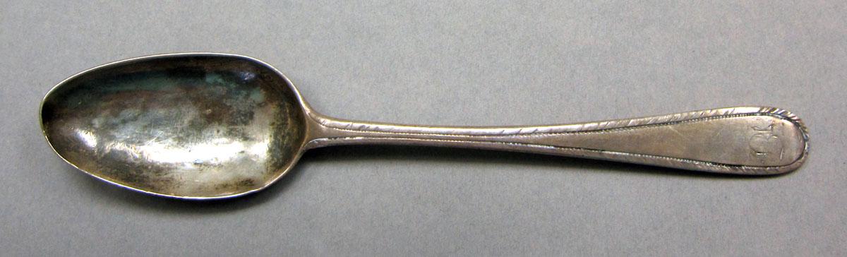 1962.0240.536 Silver spoon upper surface