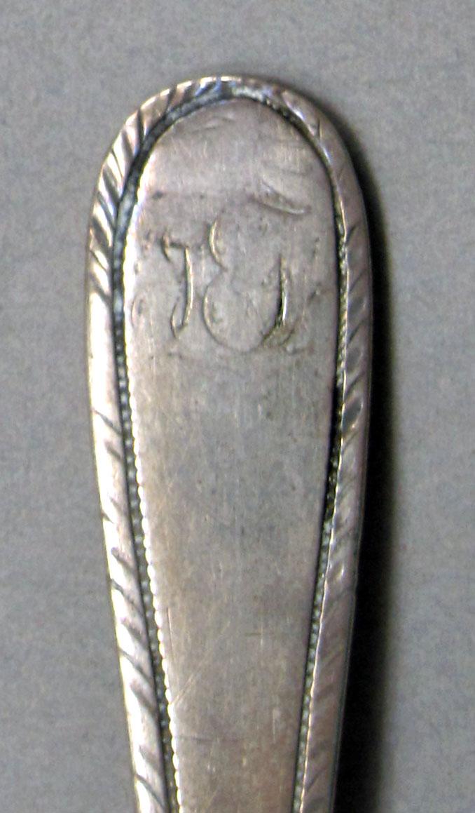 1962.0240.536 Silver spoon engraving