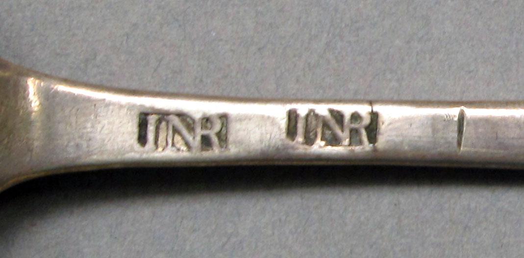 1962.0240.536 Silver spoon mark