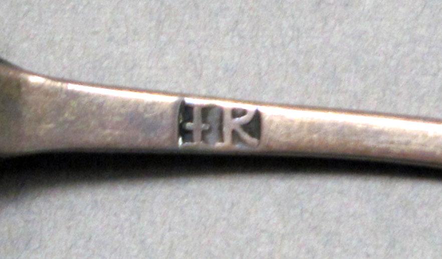 1962.0240.538 Silver spoon mark