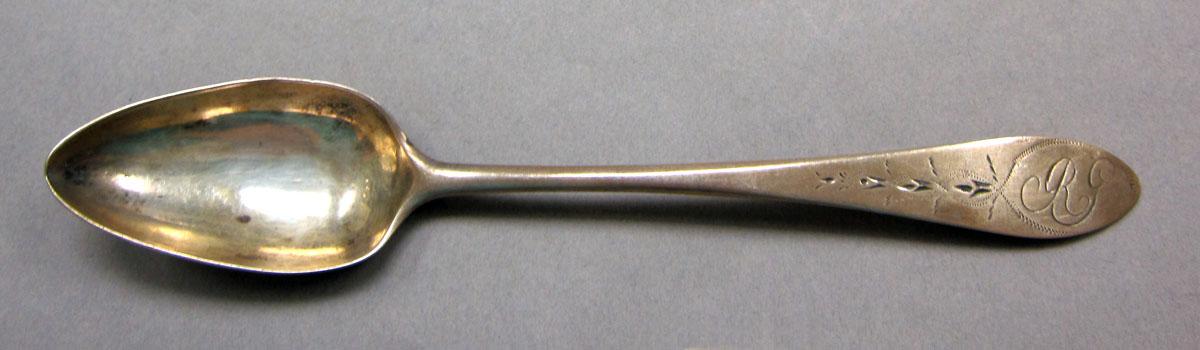 1962.0240.543 Silver spoon upper surface
