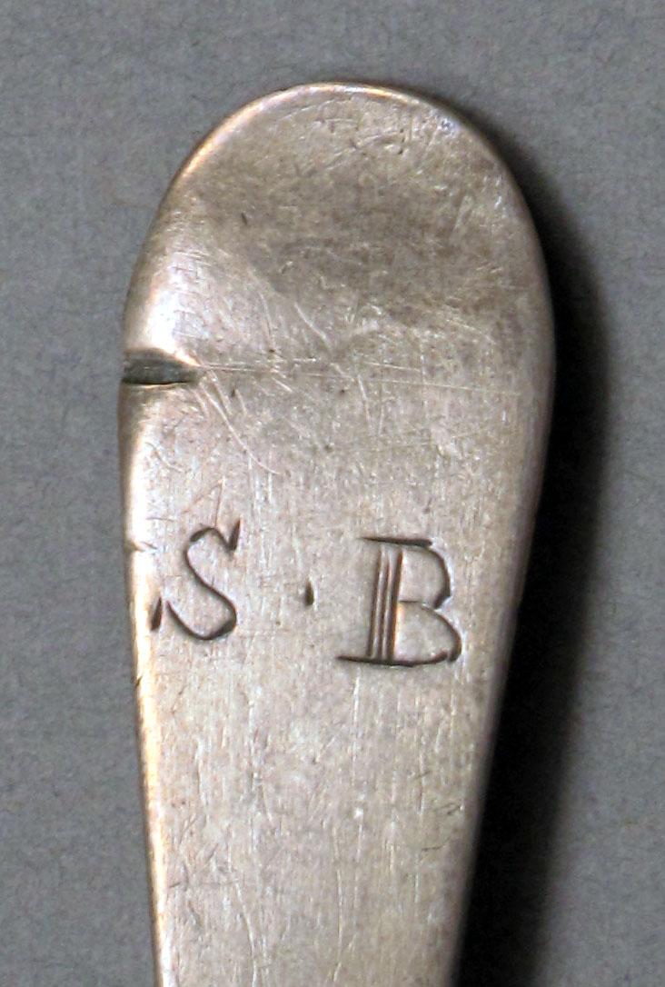 1962.0240.547 Silver spoon engraving