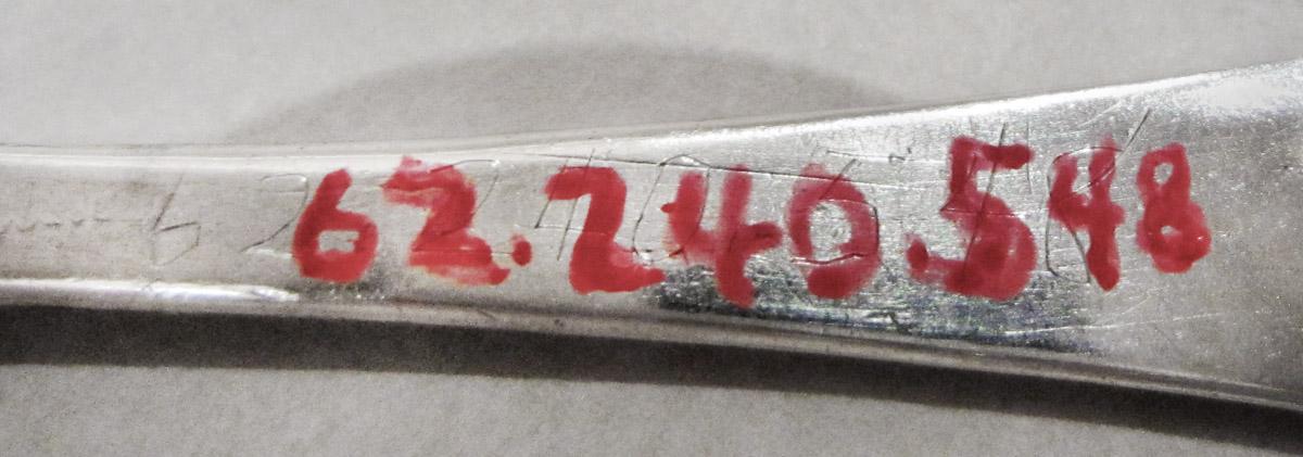 1962.0240.548 Spoon, inscription