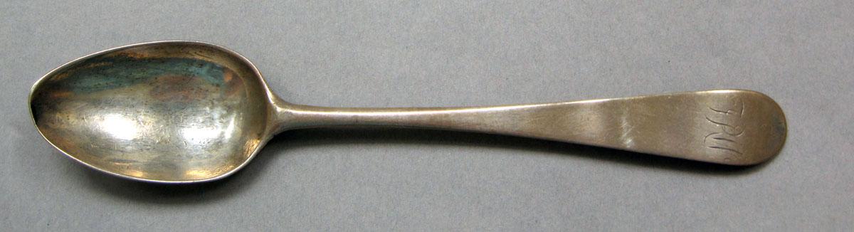 1962.0240.551 Silver spoon upper surface