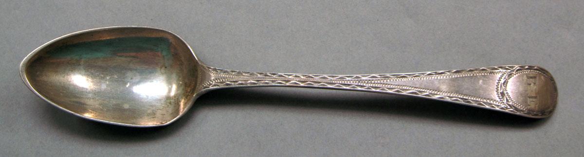 1962.0240.553 Silver spoon upper surface