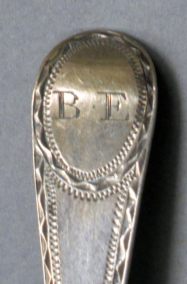 1962.0240.553 Silver spoon engraving